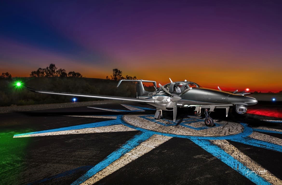 Diamond DA62 MPP parked on ramp at sunset